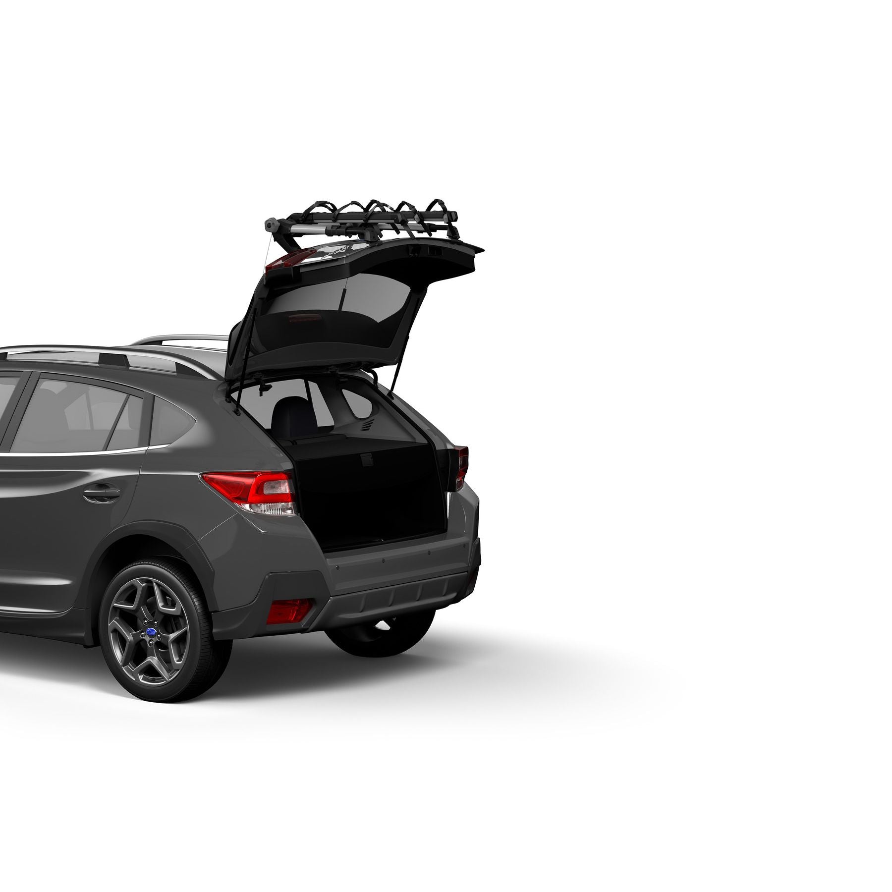 Wheelie Rack Thule OutWay Hanging 3-Bike Trunk Rack – Pop a wheelie